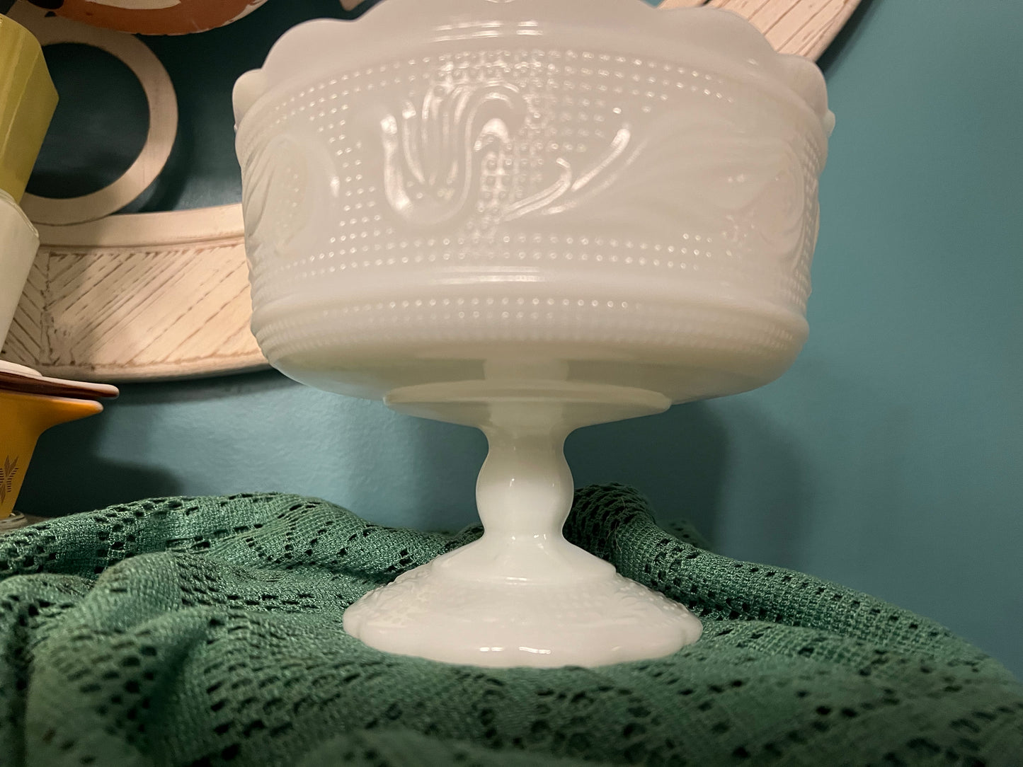 Footed milk glass fruit bowl