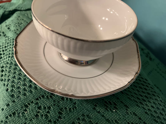 Vintage Eternity footed cup and saucer set with platinum trim