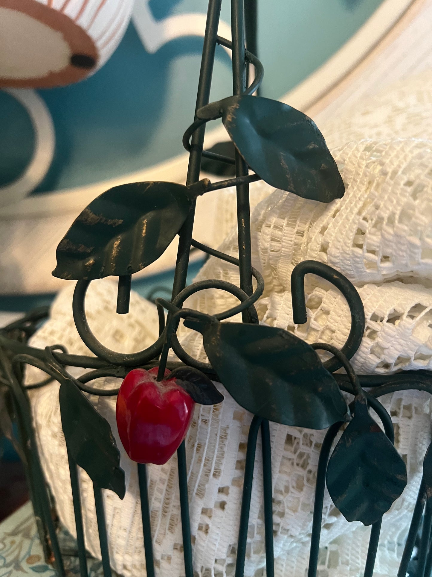 Rustic green wire basket for tabletop or centerpiece display