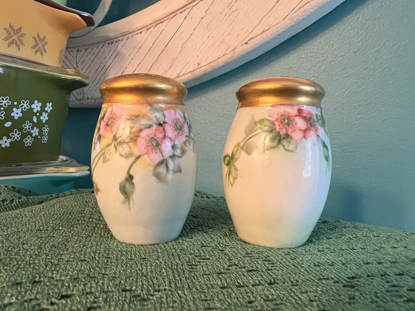 Vintage hand-painted porcelain salt and pepper shakers with pink roses and gold tops