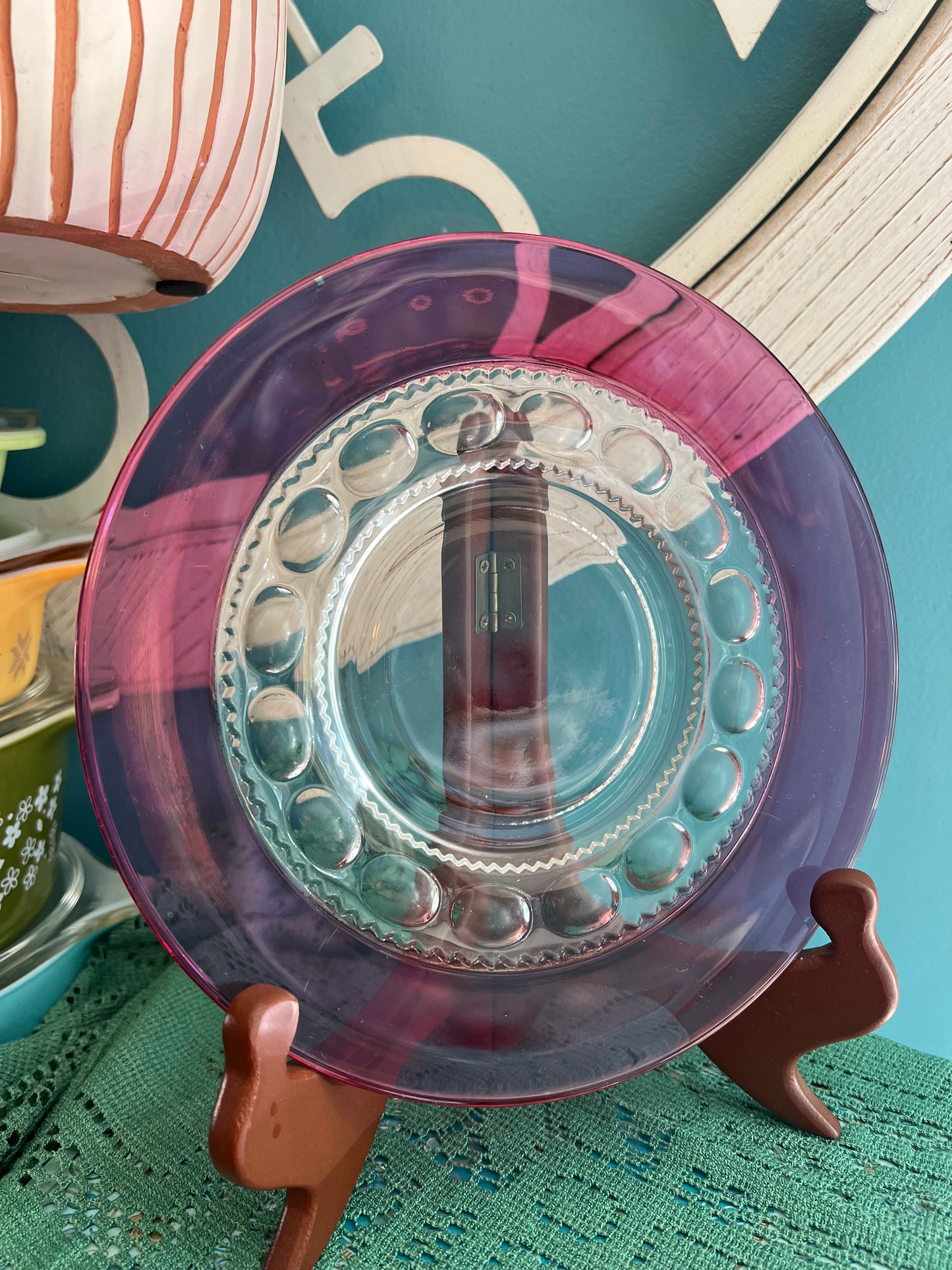 Mid-century red glass salad plate with thumbprint design