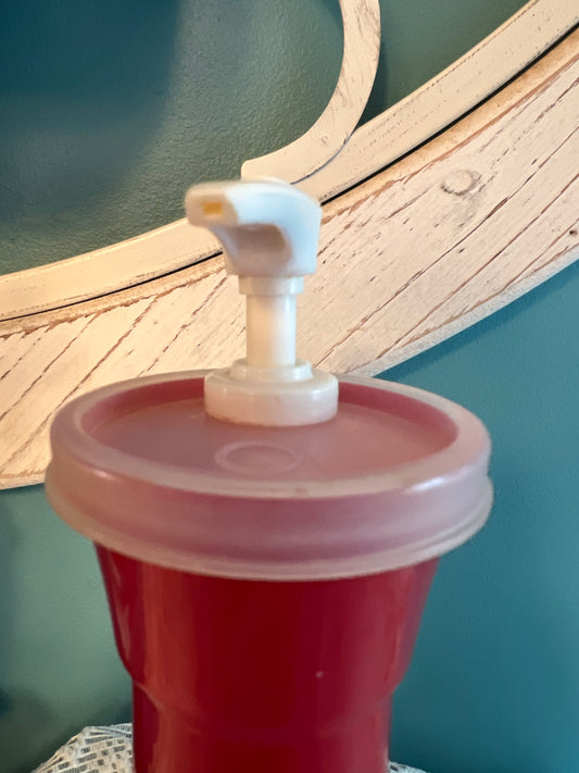 Collectible vintage Tupperware ketchup bottle for tabletop use