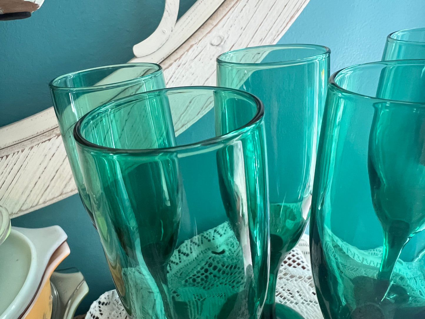 Dark green vintage Libbey champagne flutes with thin stem