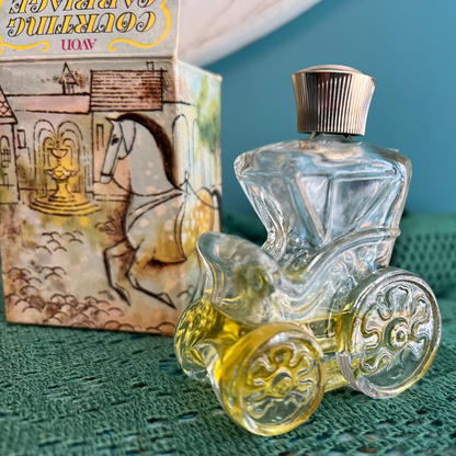 Avon Courting Carriage Moonwind cologne bottle display