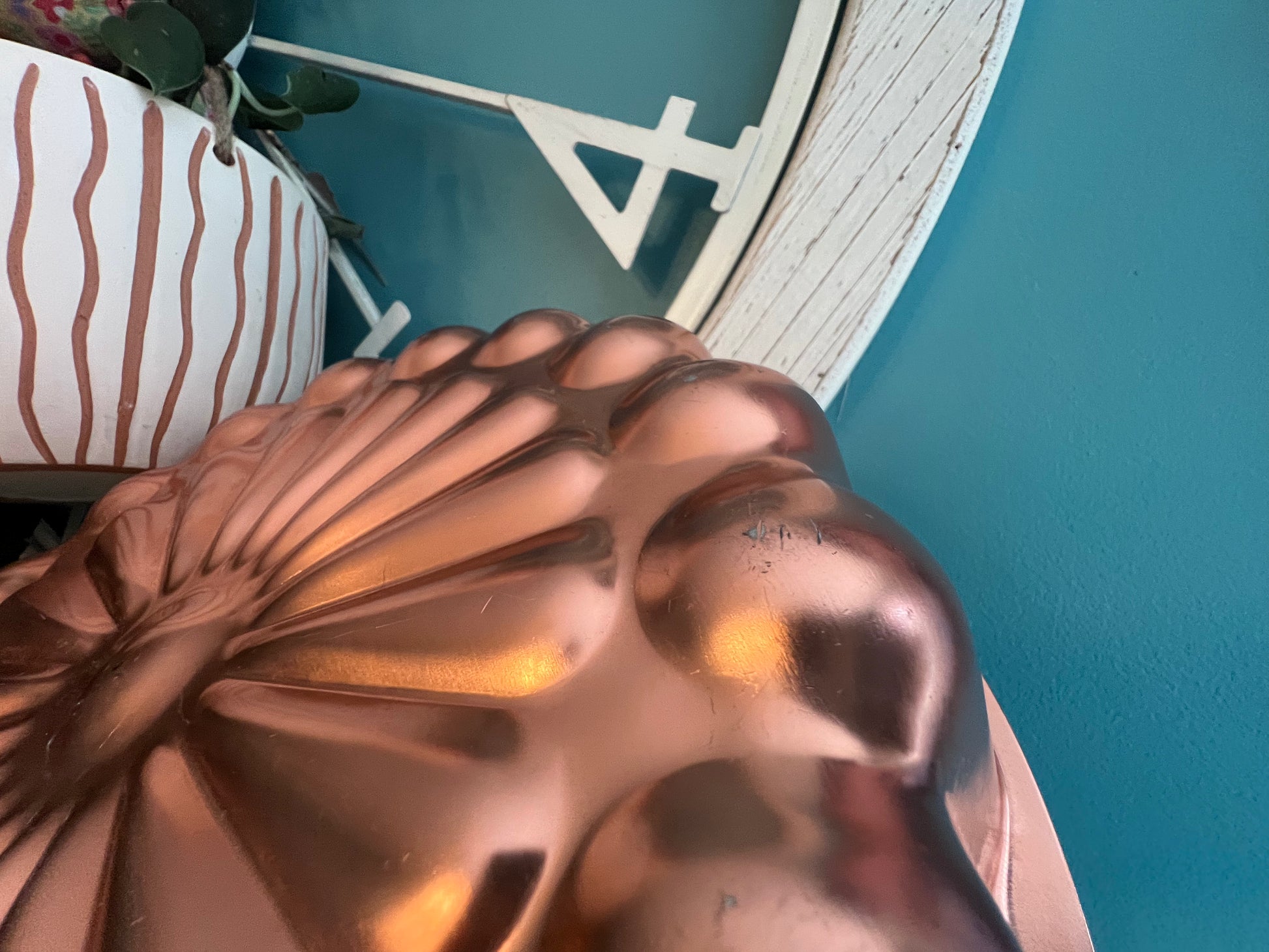 Collectible oversized copper tin mold with daisy starburst pattern