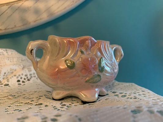 Iridescent ceramic swan vases