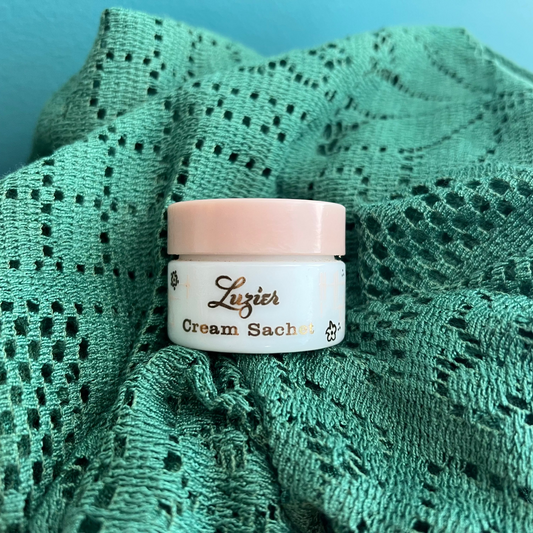Vintage Luzier cream sachet bottle collectible