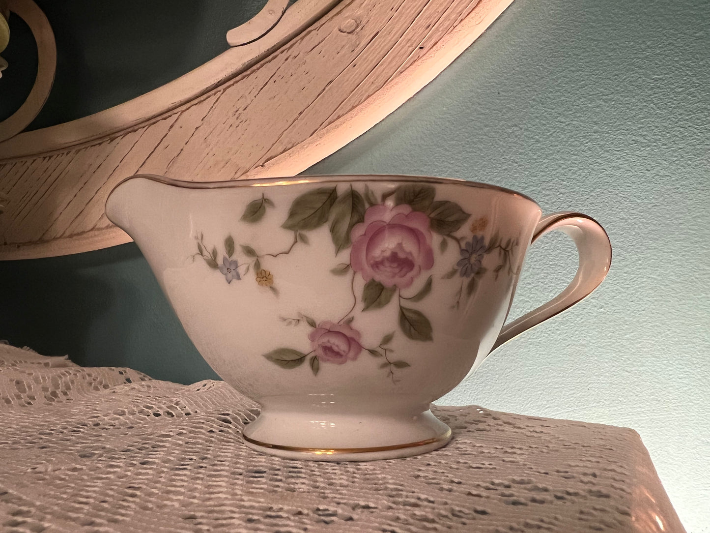 Mid-century Noritake bone china floral creamer with gold accents