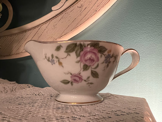 Mid-century Noritake bone china floral creamer with gold accents