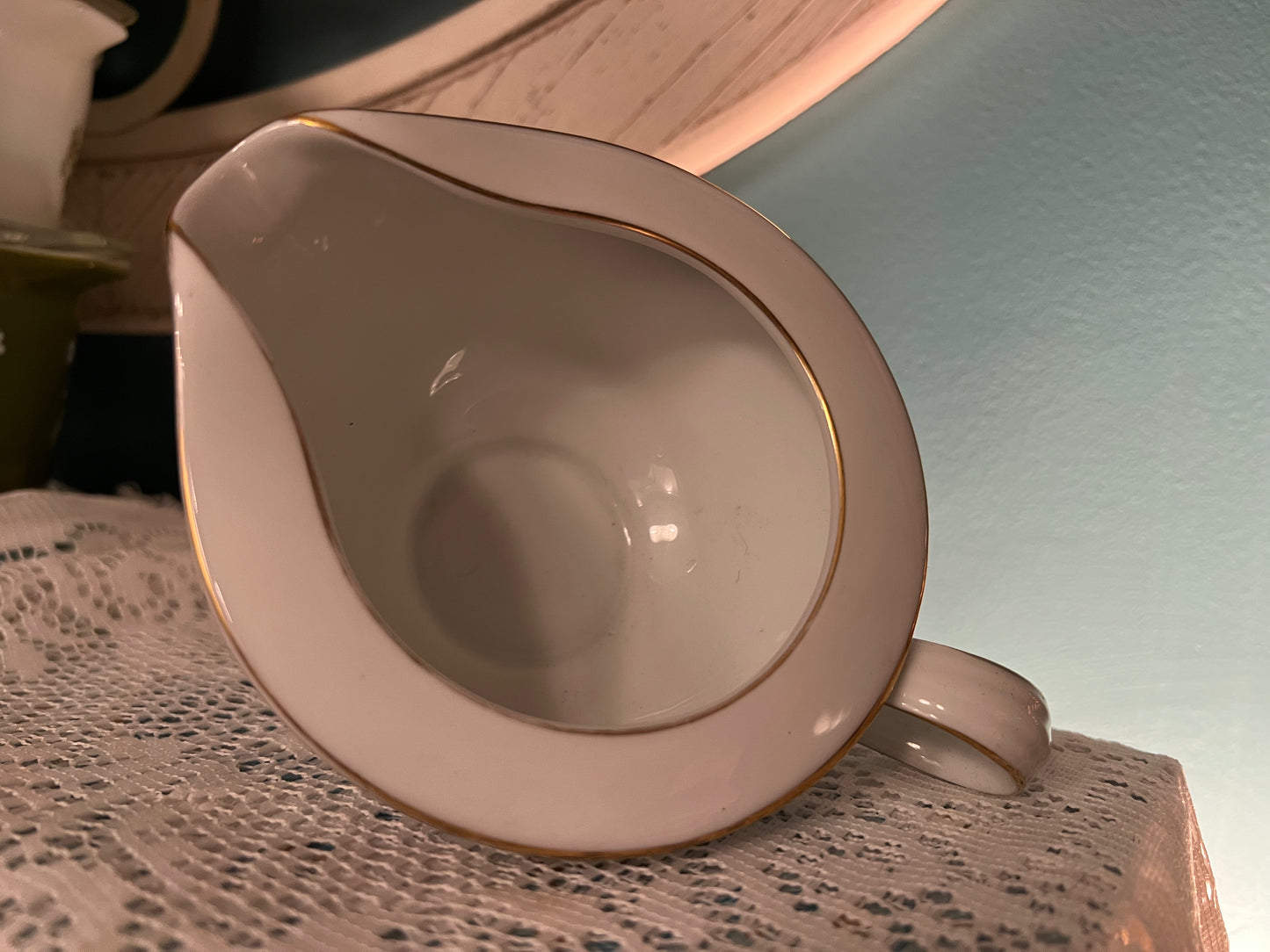 Mid-century Noritake bone china floral creamer with gold accents