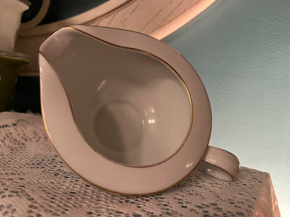 Mid-century Noritake bone china floral creamer with gold accents