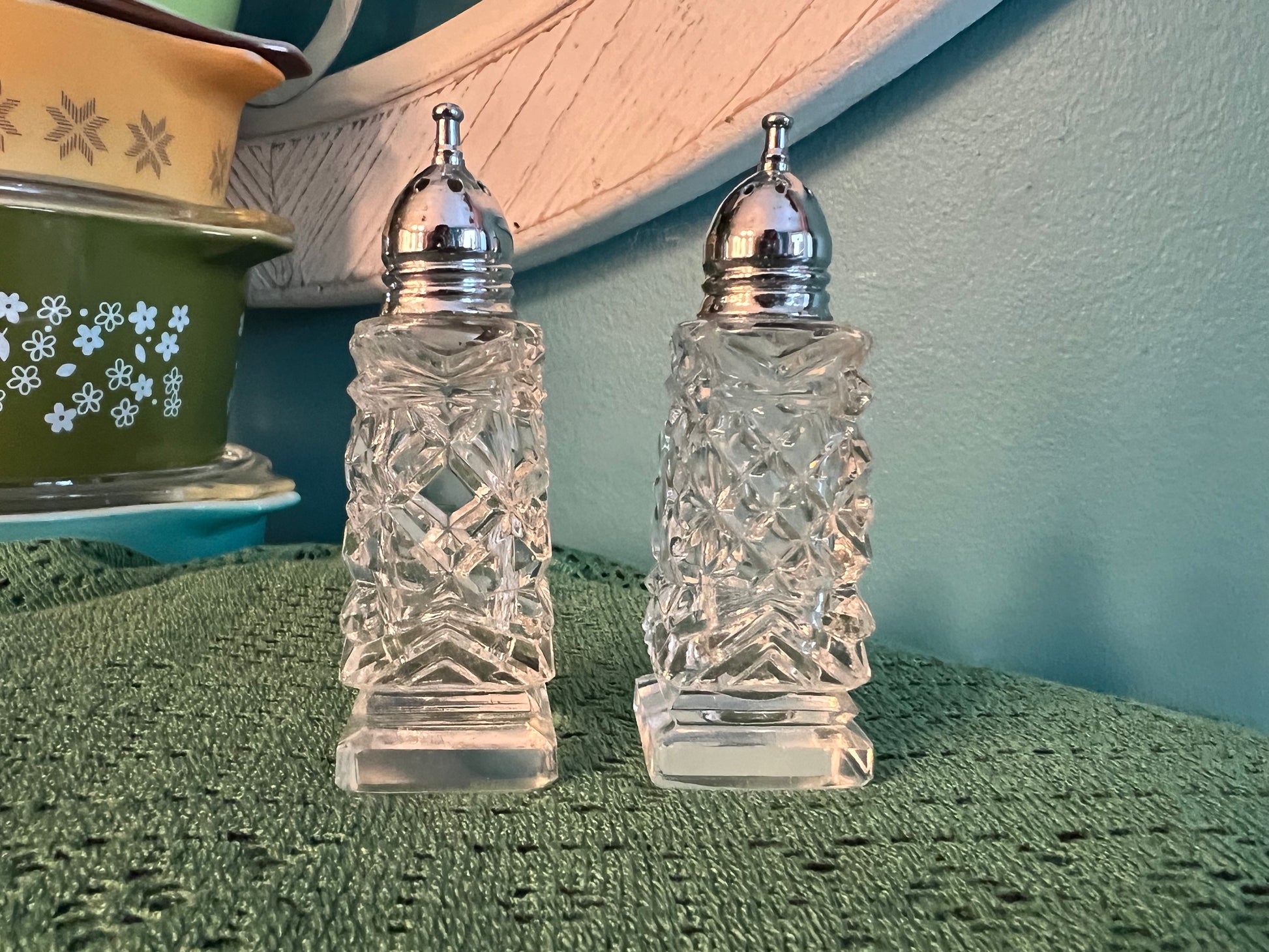 Vintage Japanese cut glass skyscraper salt and pepper shakers with silver tops
